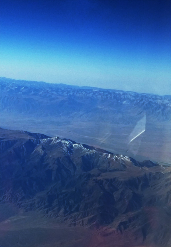 A stretch of the Rocky Mountains as seen from an airplane.