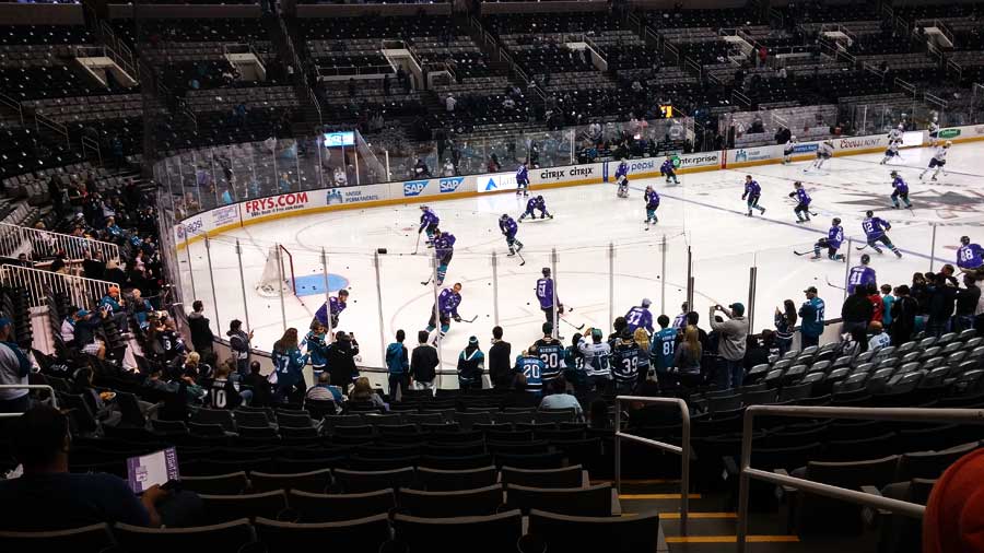 The Sharks in their purple warm-up jerseys.